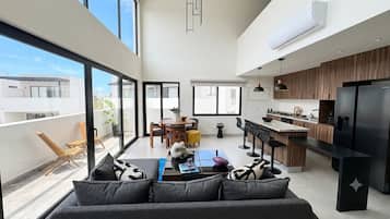 Luxury Apartment | Living area | 60-inch LED TV with cable channels