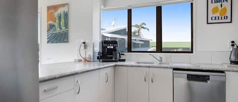 Coffee/tea maker, fridge, microwave, oven