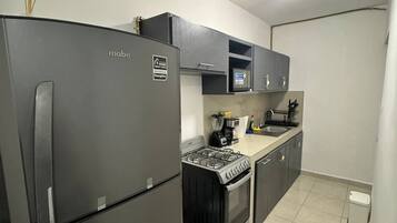 Departamento Deluxe, patio | Cocina privada