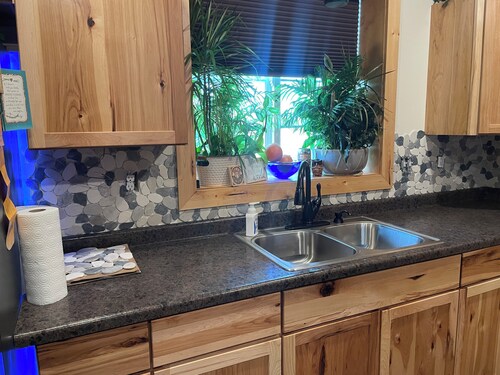 Charming 2-bedroom shouse seated on 50 acres in tranquil Long Prairie with AC.
