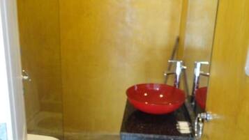 Shower, free toiletries, towels, toilet paper