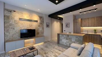 Comfort Suite, Balcony | Living area