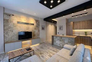Suite Comfort, balcone | Area soggiorno