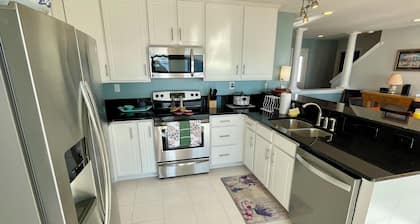 Big Waterfront House! Fishing Dock, Arcade, Garage Parking, Walk to Beach!