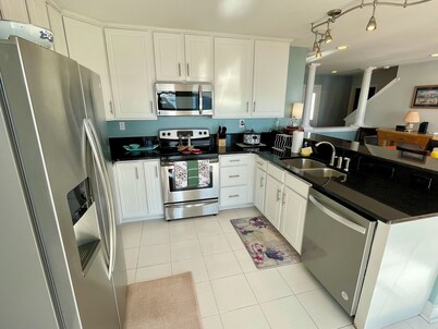 Big Waterfront House! Fishing Dock, Arcade, Garage Parking, Walk to Beach!