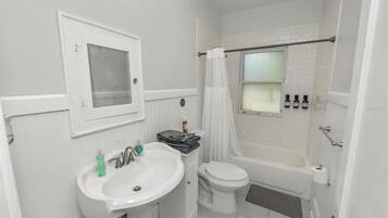 Hair dryer, towels, soap, toilet paper