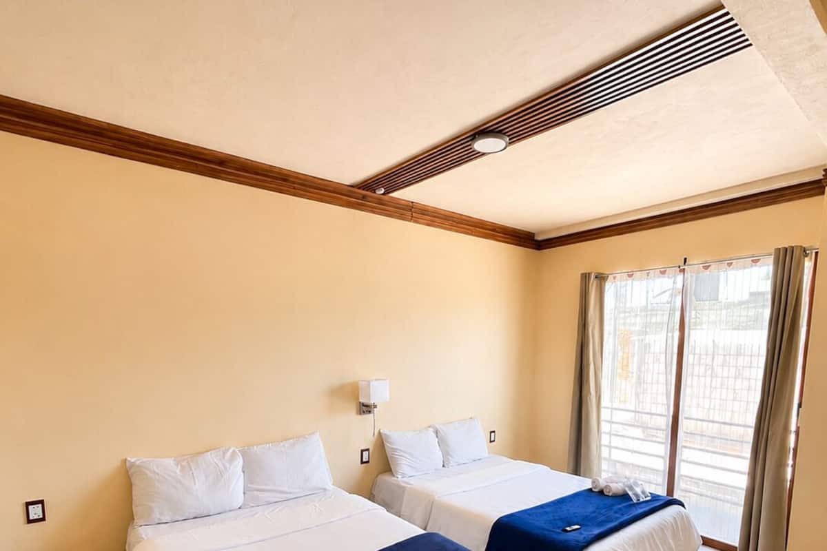 Apartemen, pemandangan kota | Brankas, tirai kedap cahaya, Wi-Fi gratis, dan seprai linen