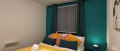 2 chambres, fer et planche à repasser, Wi-Fi, draps fournis
