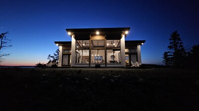 Modern 2-bedroom house on the edge of a private peninsula in Atlantic Canada.