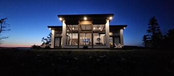 Modern 2-bedroom house on the edge of a private peninsula in Atlantic Canada.