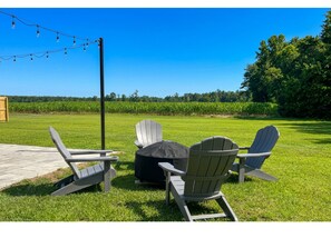 Property grounds - Escape to Fields & Firelight: Cozy 3BR Home with Fire Pit. (Maysville)