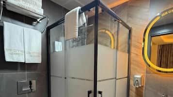 Shower, free toiletries, hair dryer, slippers