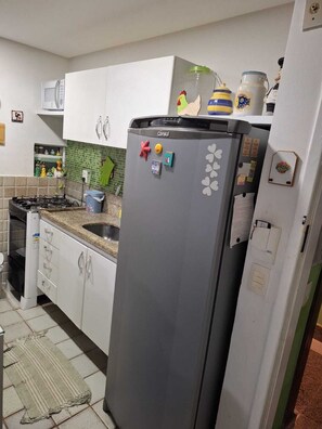 Private kitchen - Beachfront apartment in the Ancorar Resort, complete leisure facilities in Porto de Galinhas. (Ipojuca)