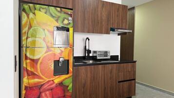 Fridge, microwave, stovetop, coffee/tea maker
