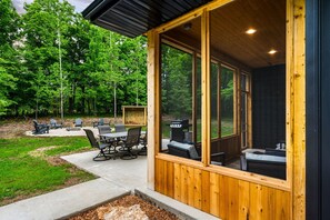 Outdoor dining - Private home on 1.5 wooded acres in Door County conveniently located in Ephraim. (Sister Bay)