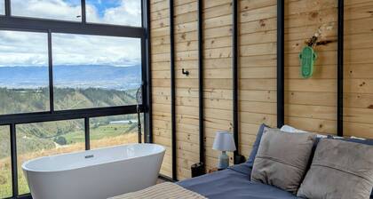 Serene luxury cabin in front of Cotopaxi volcano for a relaxing getaway