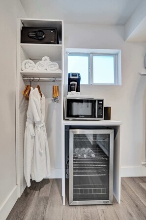 A compact kitchenette with a microwave, a mini-fridge, and a coffee maker. - Accessible King Getaway in Fort Lauderdale (Fort Lauderdale)