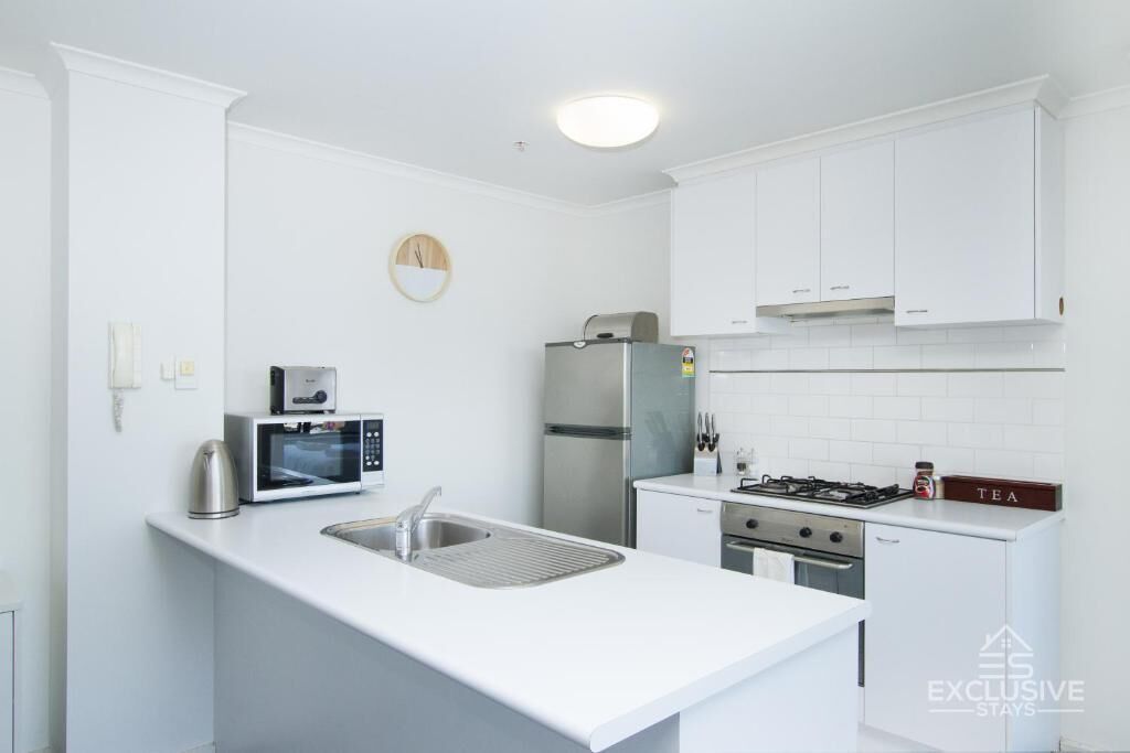 Apartamento conforto, sacada | Cozinha privada | Máquina de café expresso, cafeteira/chaleira, chaleira elétrica