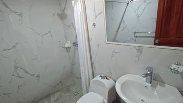 Family Triple Room, Balcony, River View | Bathroom | Shower, towels, soap, toilet paper