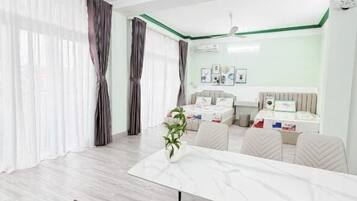 Family Room, Balcony, City View | Free WiFi