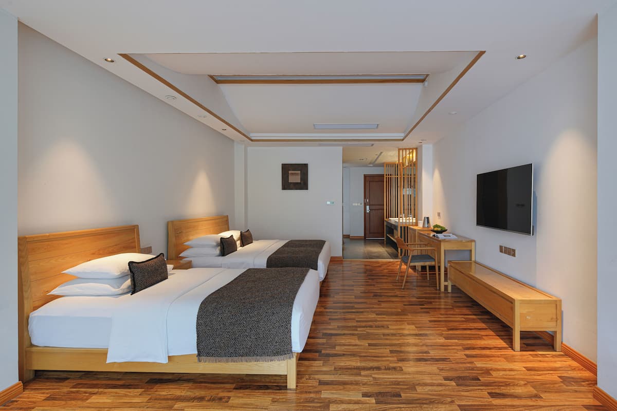 Family Suite, Pool View | Desk, laptop workspace, free WiFi, bed sheets