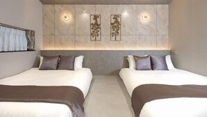 A hotel room with two beds, a marble wall, and wall-mounted lighting. - JAPAVISTA Luminous (SHIMANOUCHI, CHUO WARD)