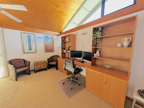 A room with a desk, two monitors, a chair, a bookshelf, and a window. - Maple Manor, Pokolbin, Hunter Valley (Pokolbin)