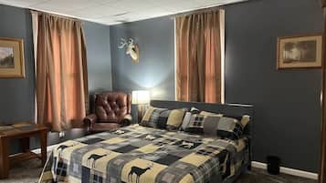 Tabla de planchar con plancha, wifi y ropa de cama