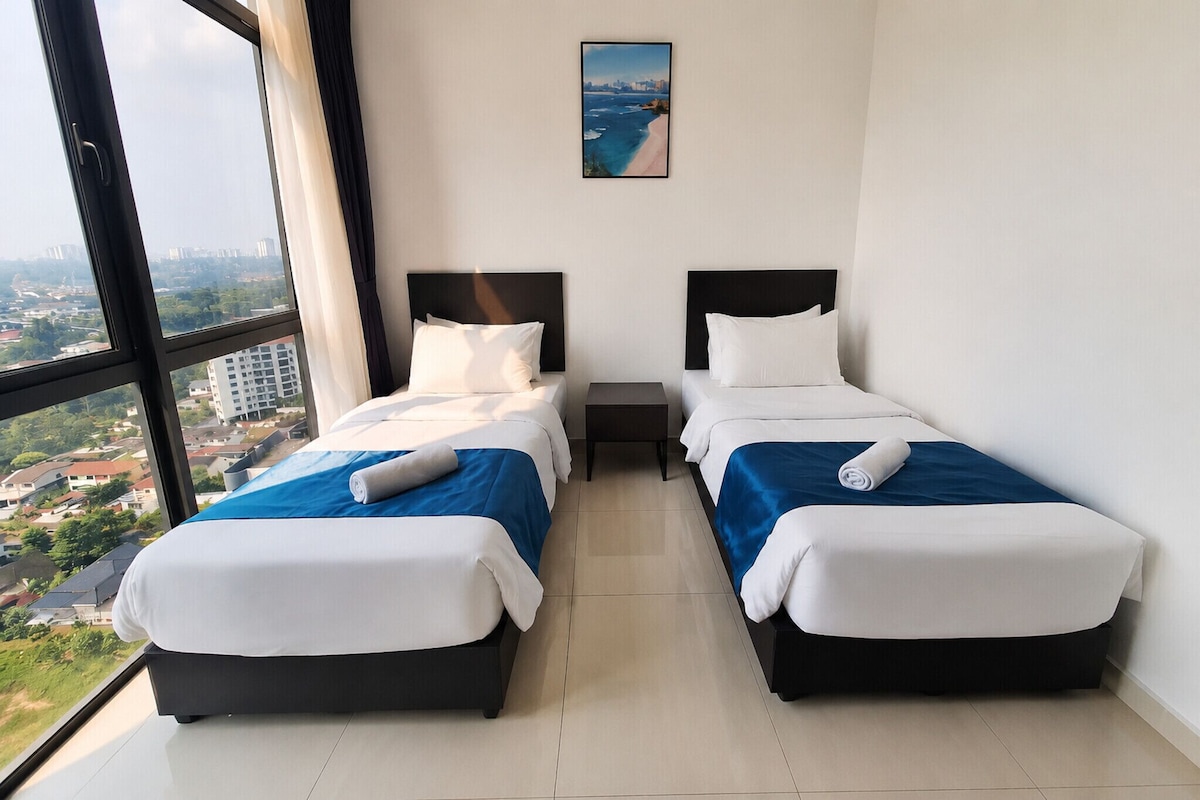 A hotel room with two beds, a nightstand, and a large window offering a city view.