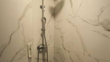 Shower, towels, soap, shampoo