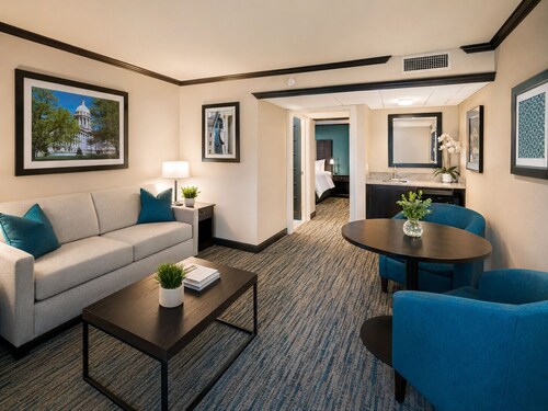 Comfortable hotel suites in enchanting Oklahoma City with fitness room, pool.