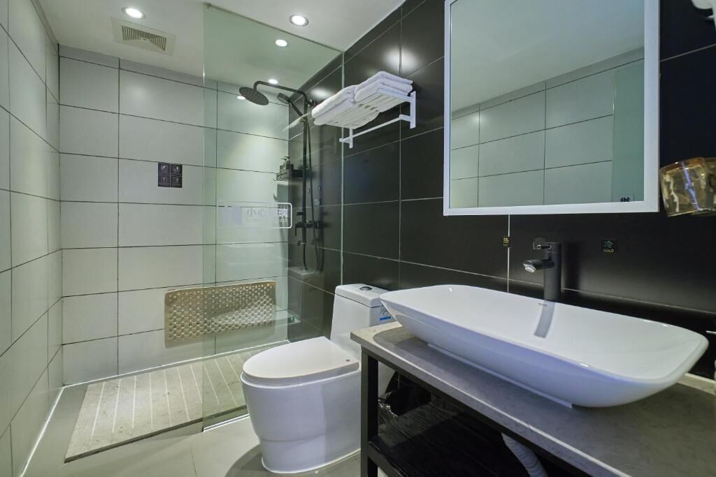 Shower, free toiletries, hair dryer, slippers
