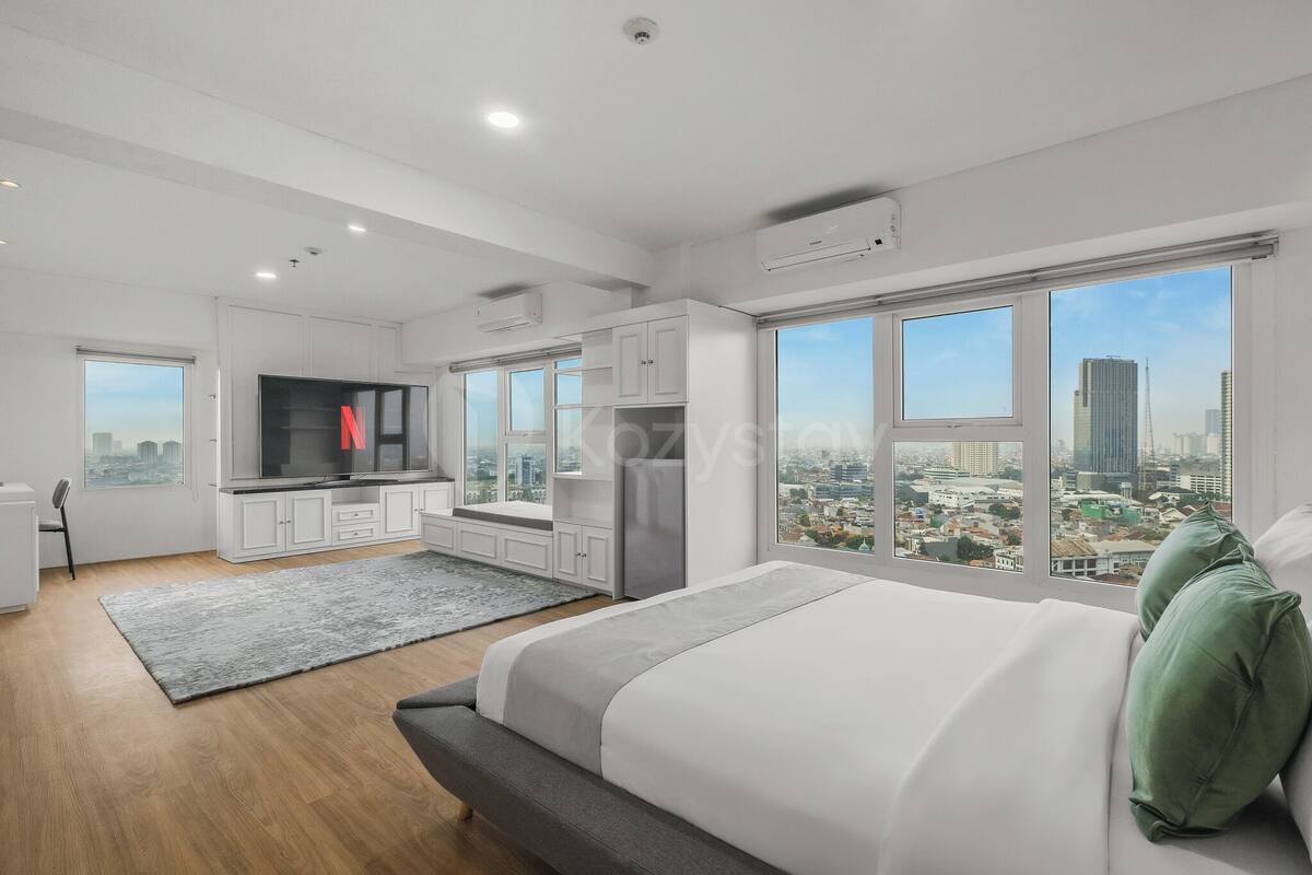 Departamento, 2 habitaciones, vista a la ciudad | Escritorio y espacio para trabajar con laptop 