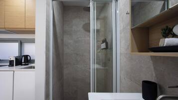 Shower, hair dryer, shampoo