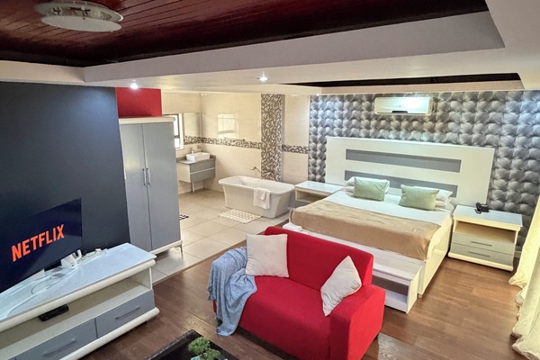 Deluxe Triple Room, Patio, Garden View | Iron/ironing board, WiFi (free)