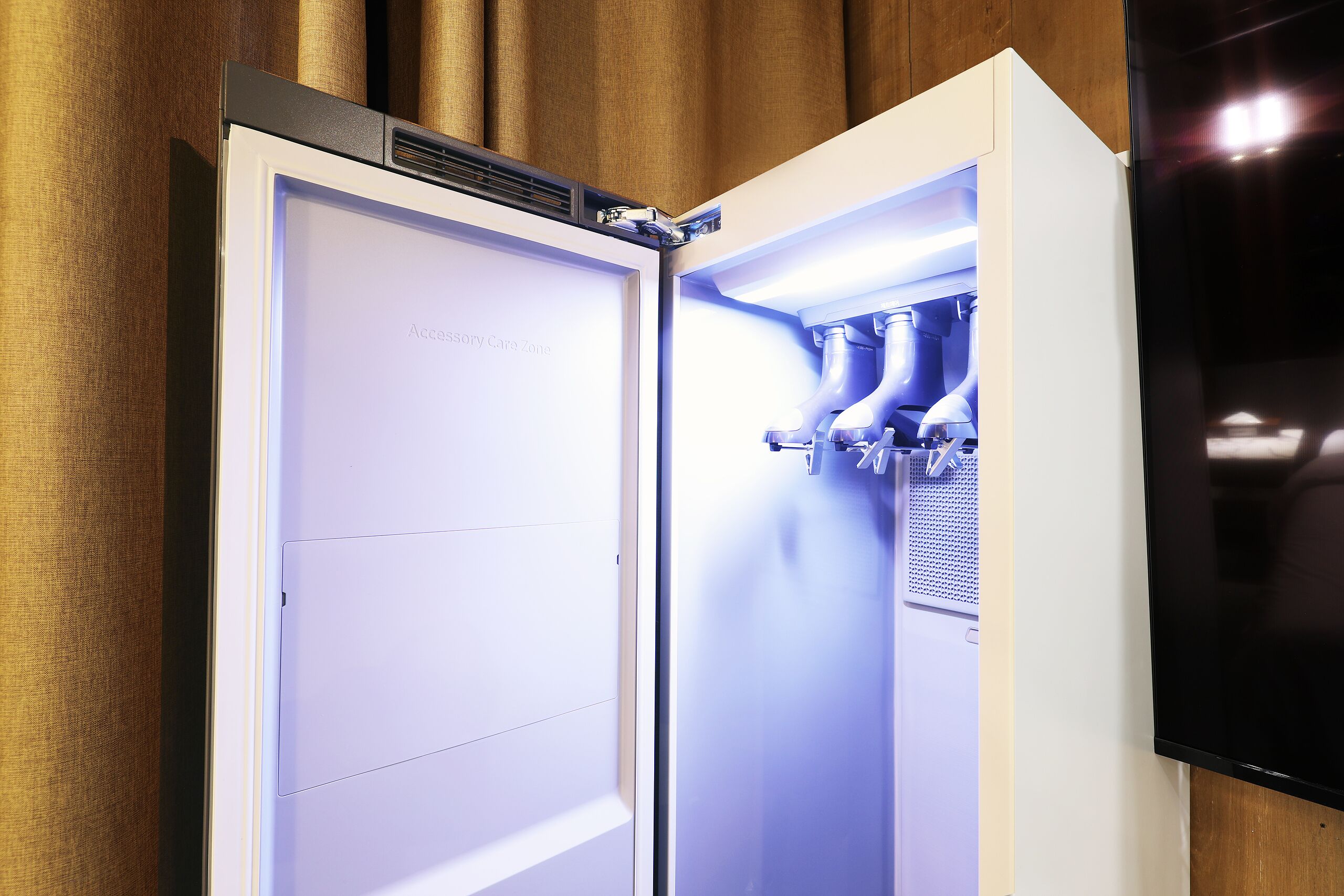 A modern kitchen with a built-in refrigerator, a microwave, and a stove.