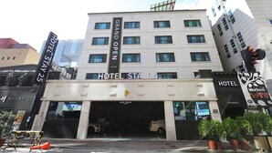 A hotel with a sign reading 'HOTEL STAY 25' and 'GRAND OPEN'. - Stay25 (Seongnam)