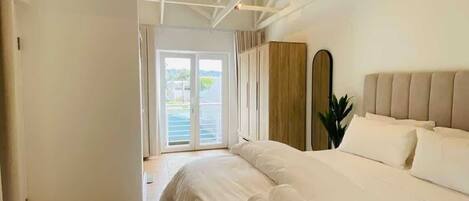 2 habitaciones, tabla de planchar con plancha, wifi y ropa de cama
