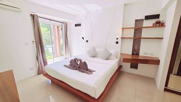 Apartment, Balcony, Resort View | In-room safe, iron/ironing board, free WiFi