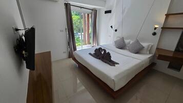 Apartment, Balcony, Resort View | In-room safe, iron/ironing board, free WiFi