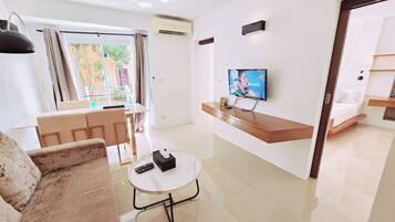 Apartment, Balcony, Resort View | In-room safe, iron/ironing board, free WiFi
