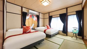 Tabla de planchar con plancha, wifi gratis y ropa de cama