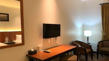 Desk, laptop workspace, free WiFi, bed sheets