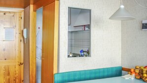A small kitchenette with a window, a sink, and a countertop. - La Grand'Ourse (Breuil-Cervinia)