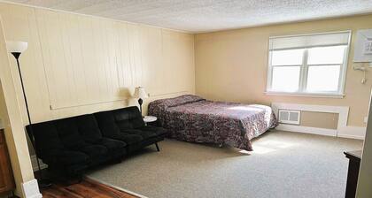 Premium Queen Bed with Kitchenette