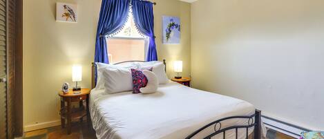 1 bedroom, desk, iron/ironing board, travel crib