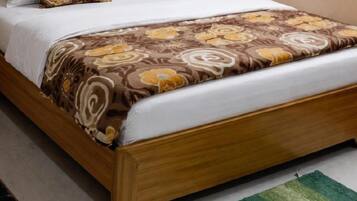 Deluxe Room | Rollaway beds, bed sheets