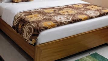 Chambre Deluxe | Lits pliants/supplémentaires, draps fournis