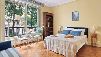 Iron/ironing board, travel crib, free WiFi, bed sheets