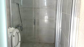 Hair dryer, towels, soap, shampoo